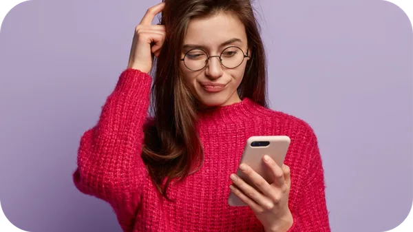 Woman reviewing website test results on her phone — Dlyte user testing platform