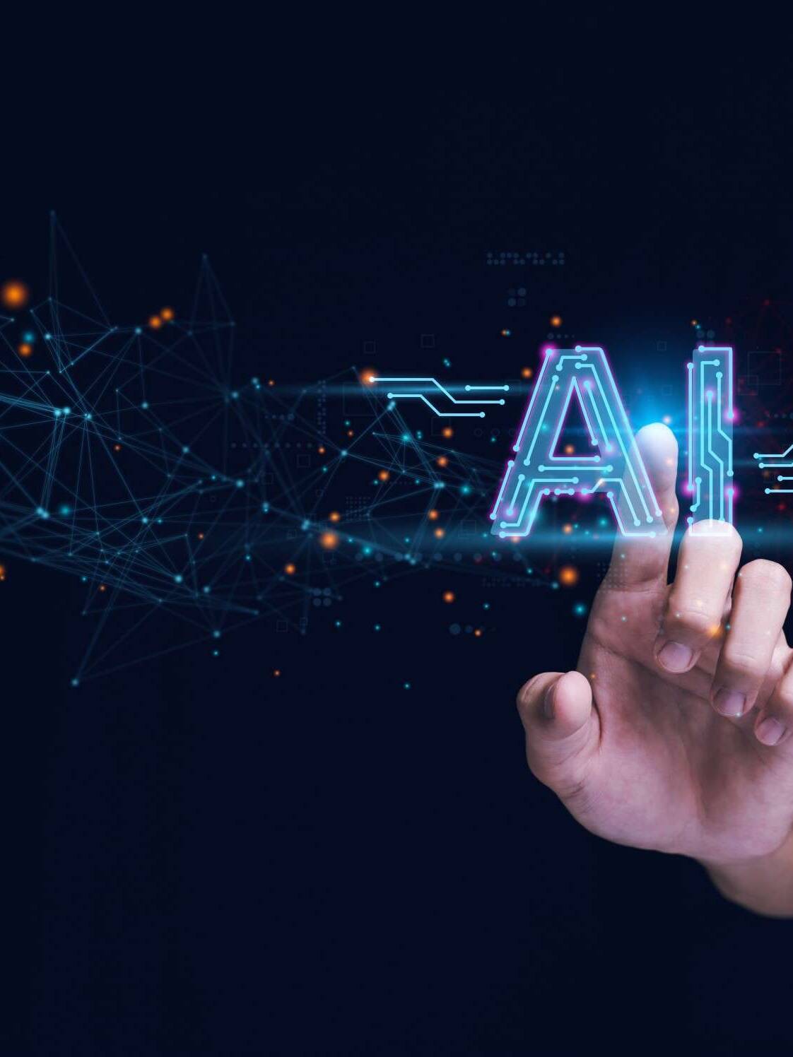Hand reaching toward a glowing 'AI' text surrounded by a network of digital nodes and glowing points, symbolizing artificial intelligence and connectivity.